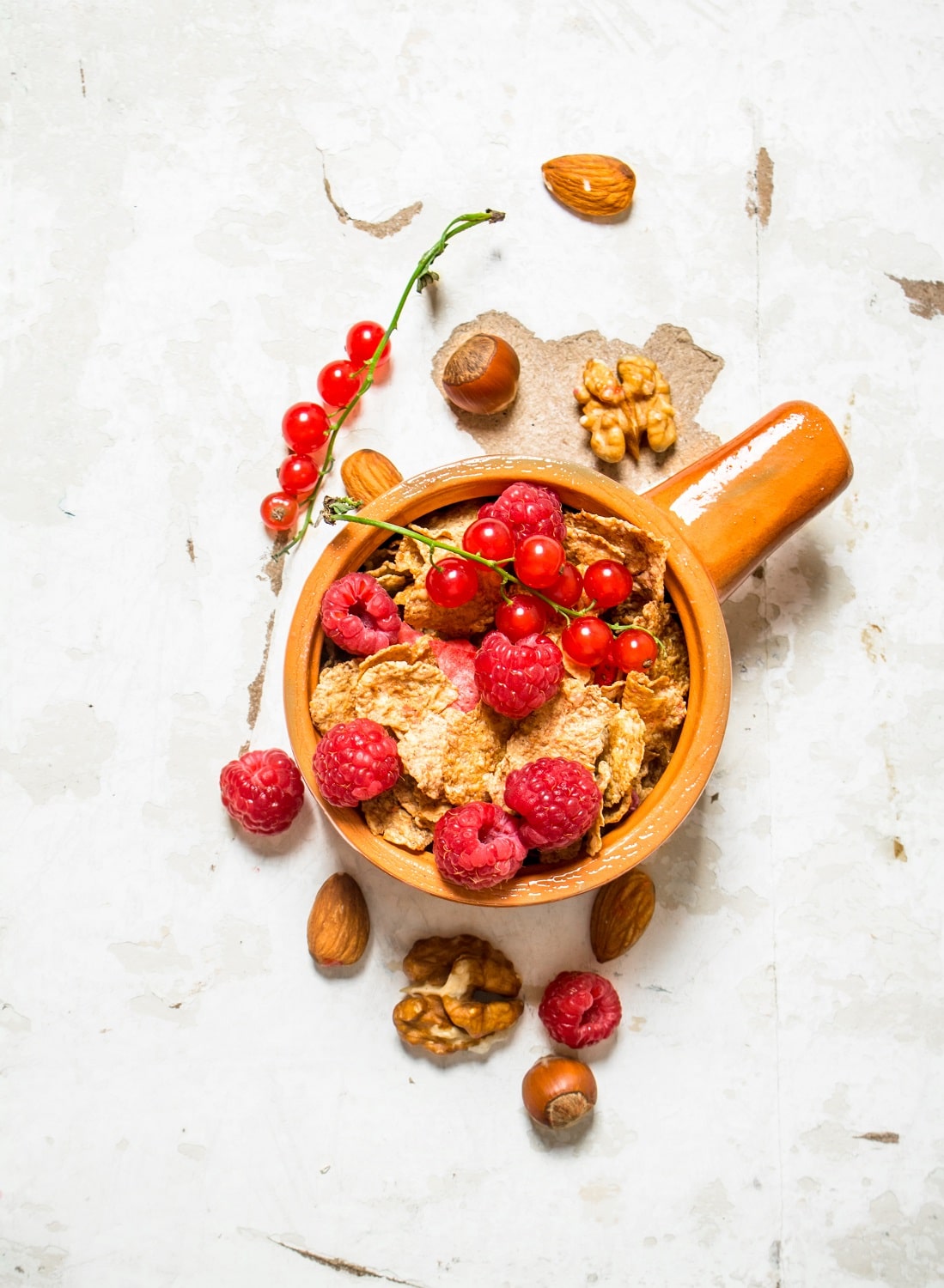 fitness-food-muesli-with-ripe-raspberries-and-nut-2021-09-03-10-17-10-utc-min.jpg